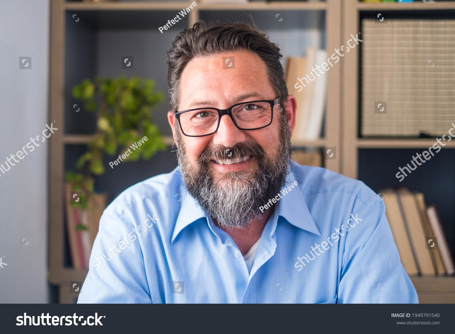 stock-photo-portrait-of-one-young-and-happy-cheerful-man-smiling-looking-at-the-camera-having-fun-headshot-of-1949791540